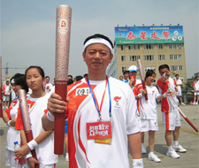The torch Guang hongguang: enhancing the economic strength of support undertakings of physical cultu